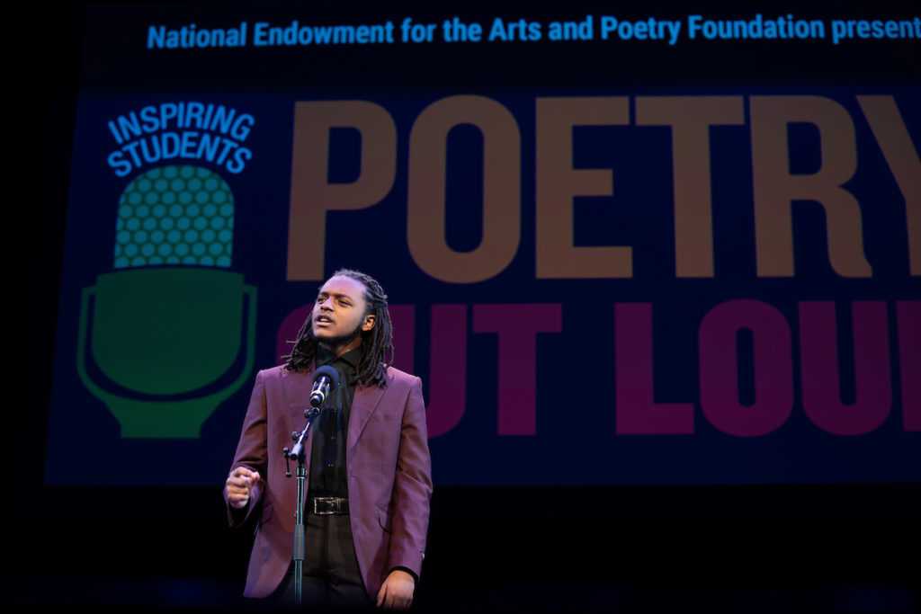 Photo of Florida Champion Zhaedyn Hodge Sigars performing at Poetry Out Loud, Howard W. Blake HS © James Kegley ([from the Poetry Out Loud Photo Gallery](https://www.poetryoutloud.org/about-poetry-out-loud/photo-galleries/)).