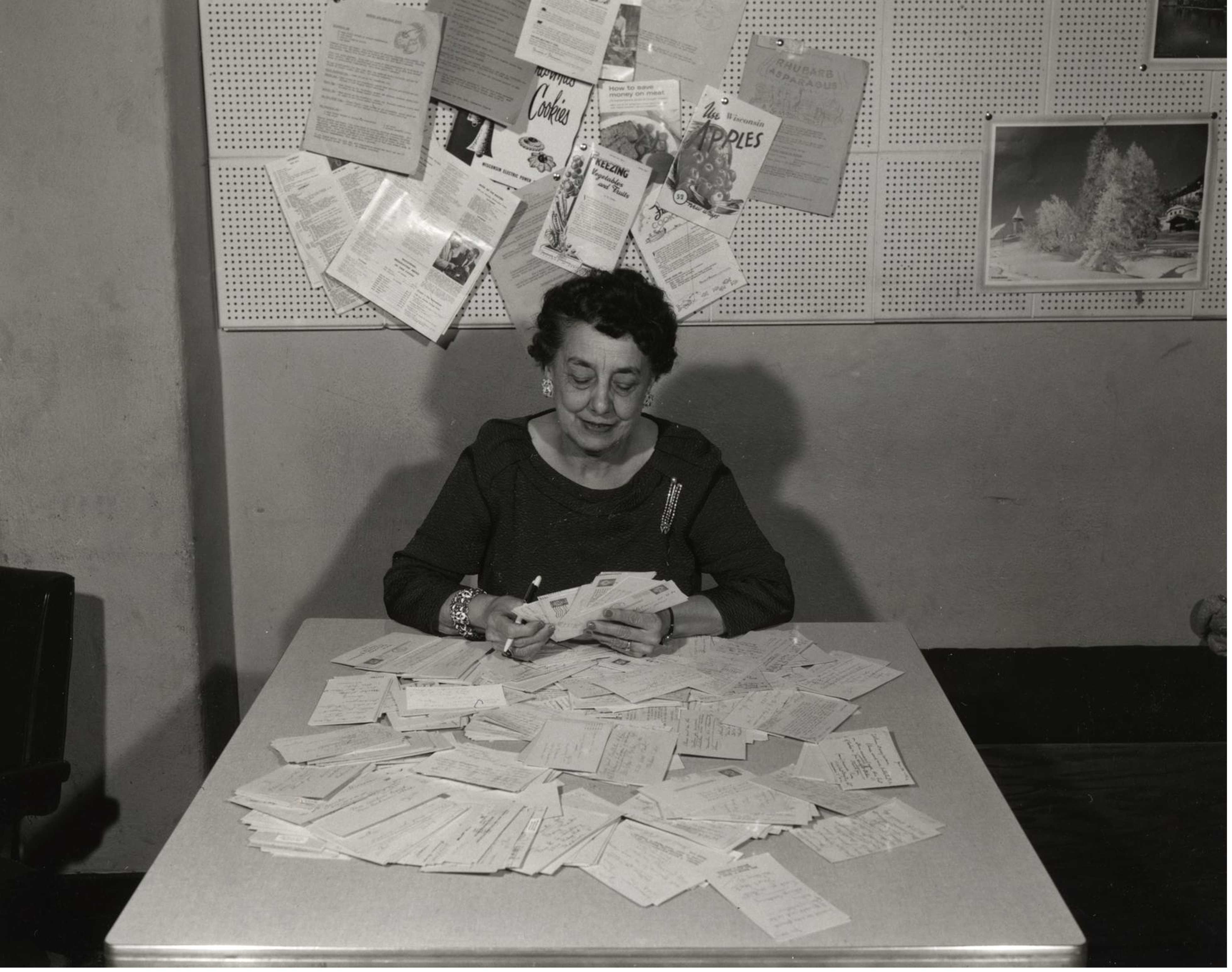 Aline Hazard reading listener mail in 1962. <https://search.library.wisc.edu/digital/ABOI7WDSYFEJV284>