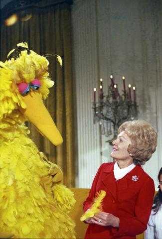 First Lady Pat Nixon Receives a Christmas Gift Feather from Sesame Street's Big Bird. December 1970, The Nixon Library. <https://commons.wikimedia.org/wiki/File:Pat_Nixon_and_Big_Bird.jpg>